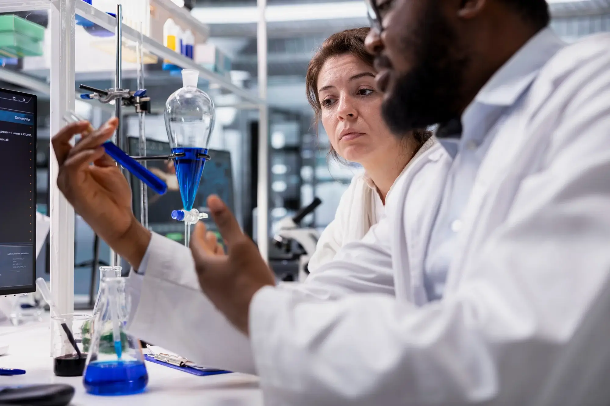 LC autosampler carousel with sample vials, supporting analytical method development and phase appropriate method validation