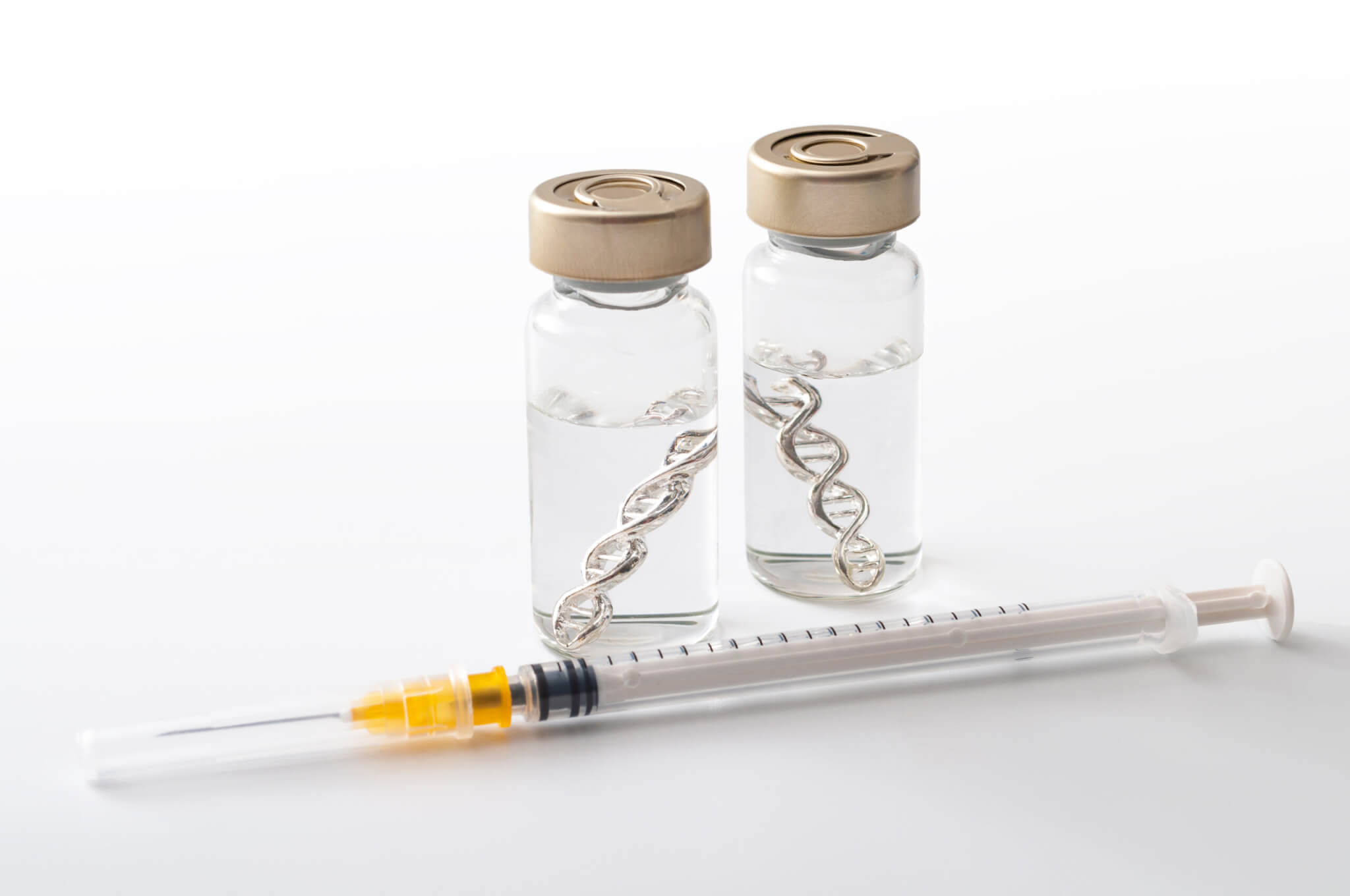 Self-amplifying RNA vaccine vials and syringe representing mRNA-based therapeutics